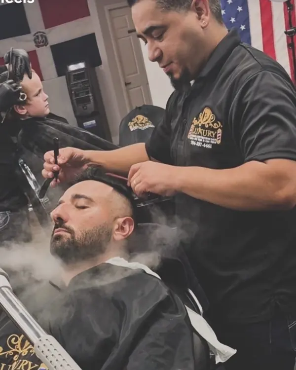Hot towel steam during a beard shave